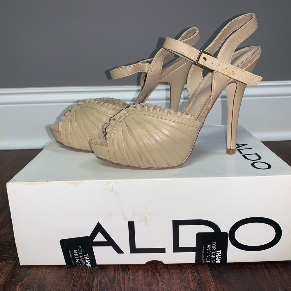 Aldo cream colored high heels.